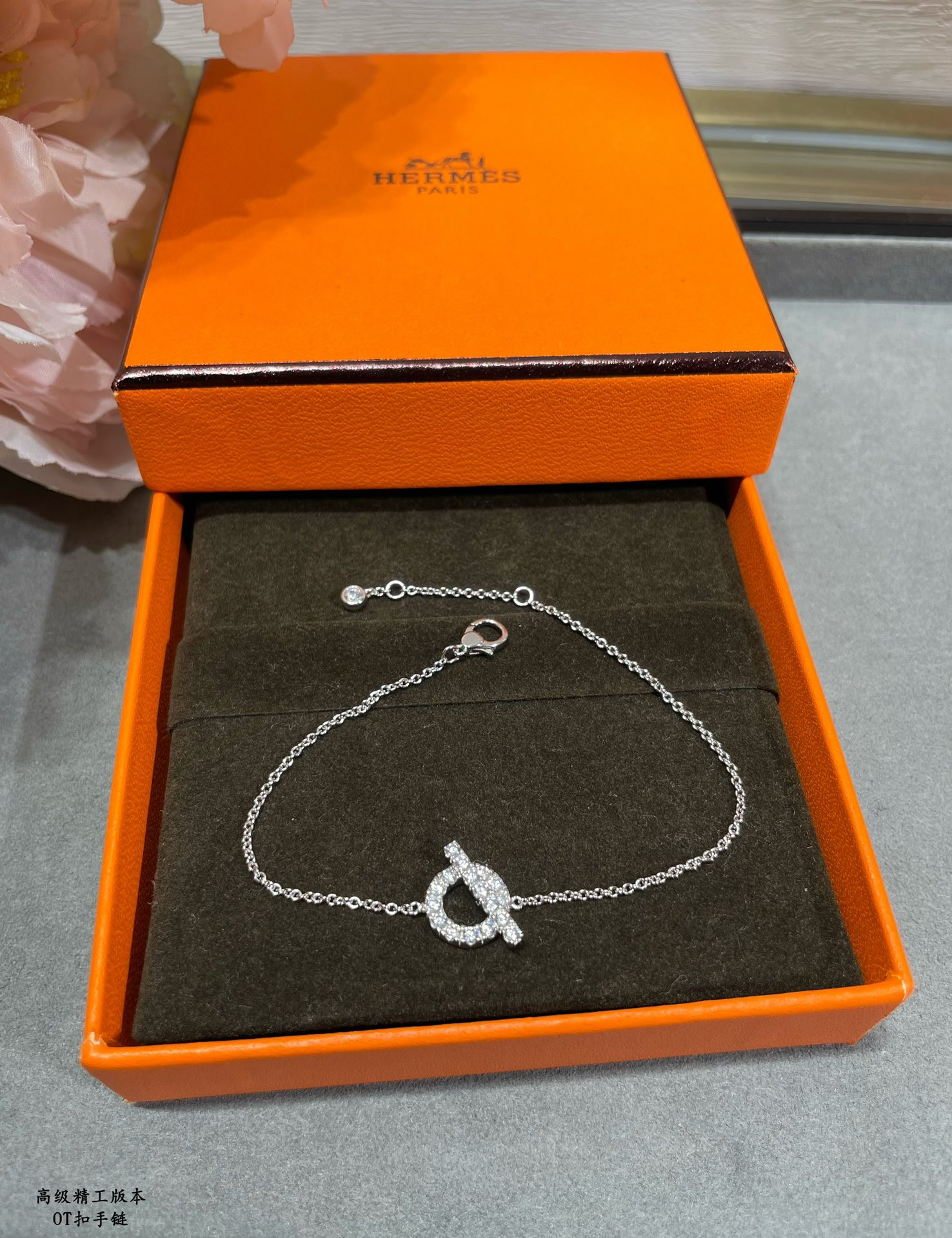 h**mes ot clasp fully Di*m*nd-encrusted bracelet