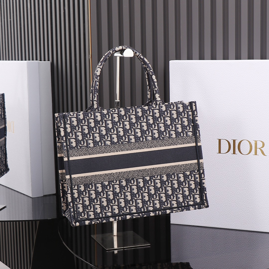 medium D*or book tote ecru and blue D*or oblique embroidery 14 x 11 x 6.5 inches