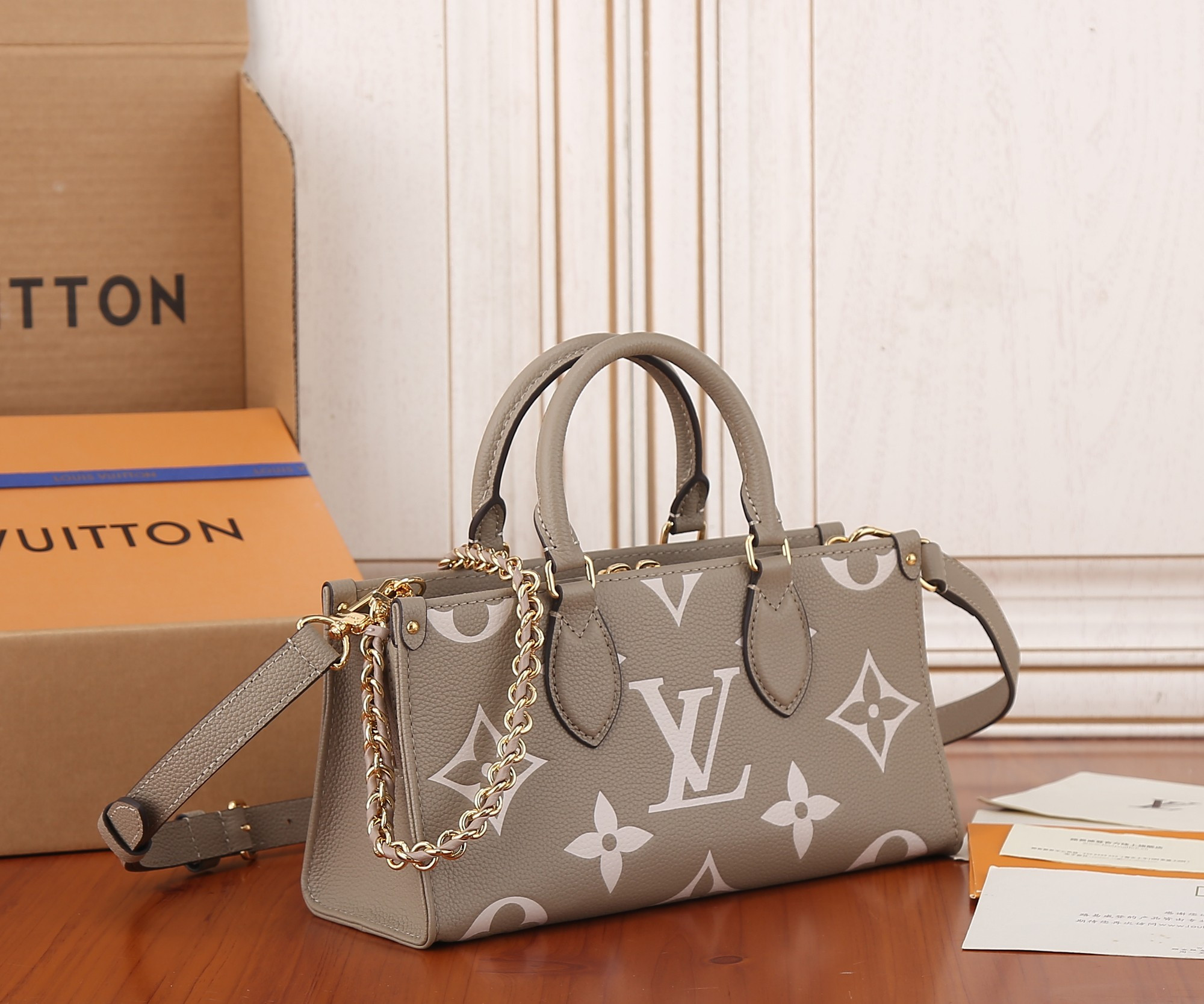 LV OnTheGo East West M23641 9.8 x 5.1 x 3.9 inches