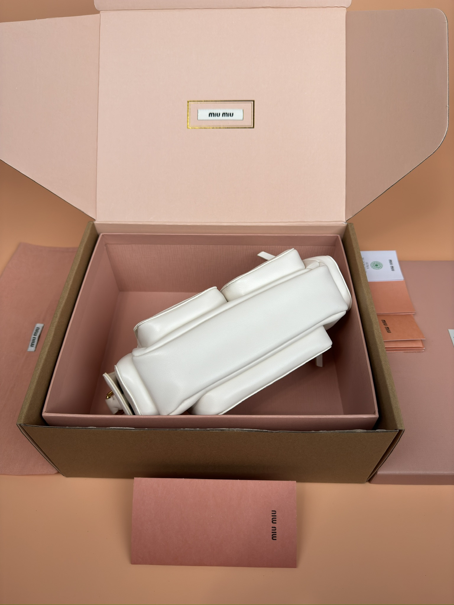 Miu Miu Hobo Nappa leather pocket bag 12x21x6cm