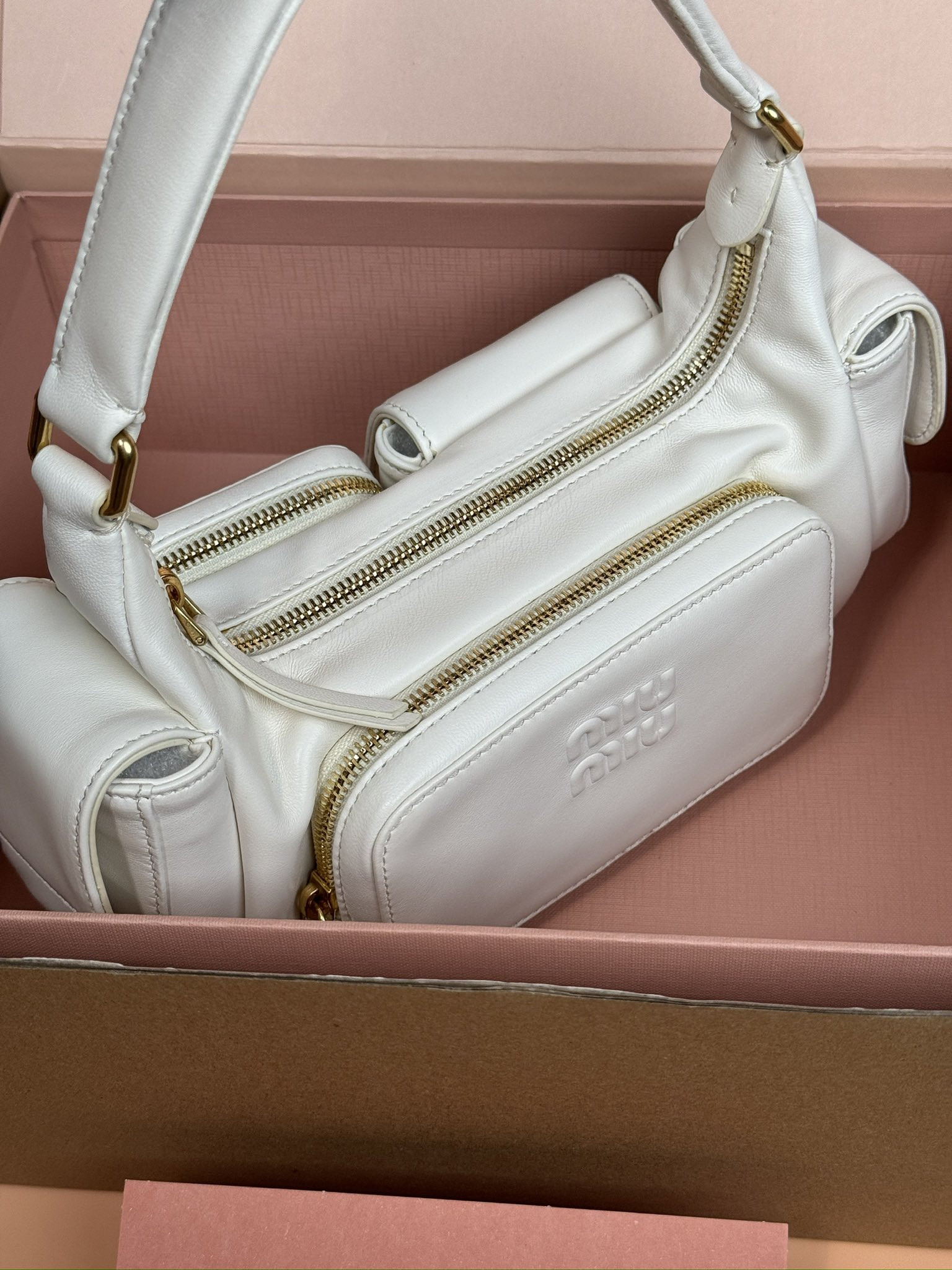 Miu Miu Hobo Nappa leather pocket bag 12x21x6cm