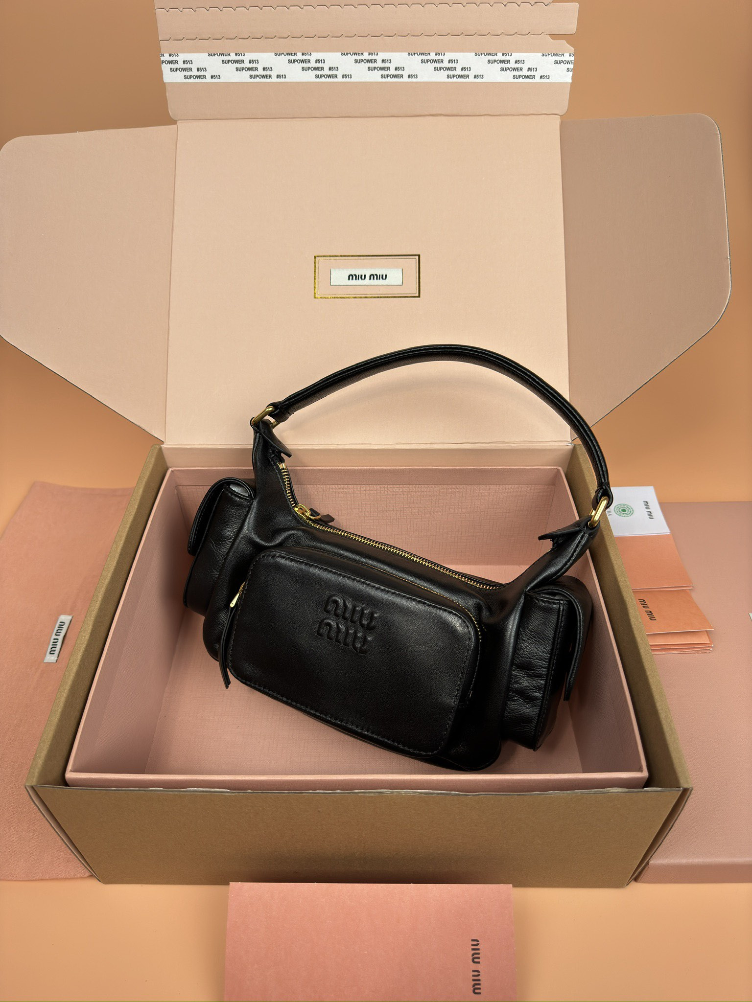 Miu Miu Hobo Nappa leather pocket bag 12x21x6cm