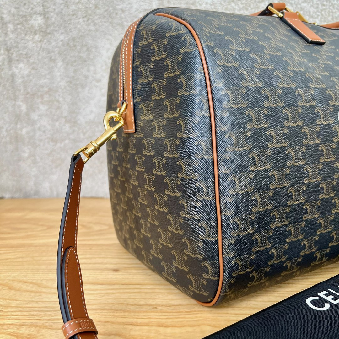 Ce**e large travel bag in triomphe canvas with Ce**e print 50x27x23cm